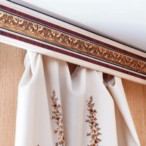 A decorative curtain featuring a gold border and an intricate floral design, enhancing the elegance of the room.